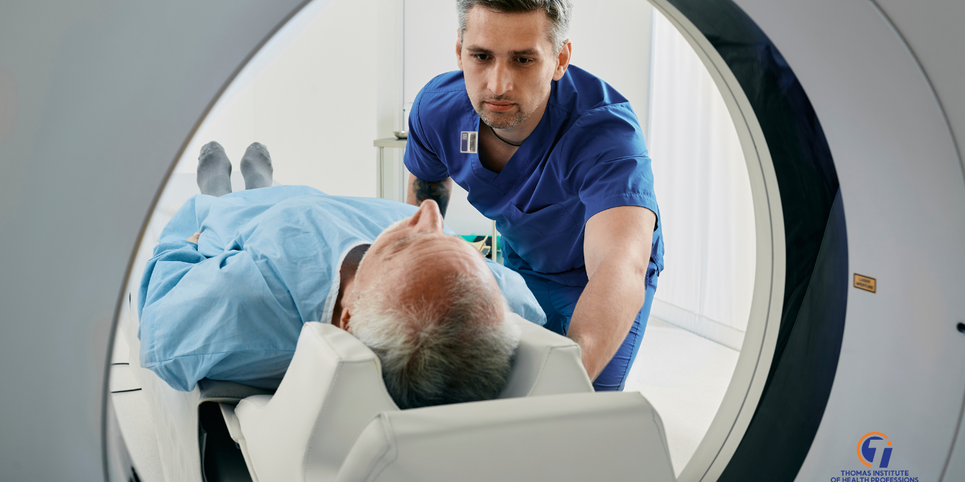 CT Technologist Putting Patient Into CT Scanner