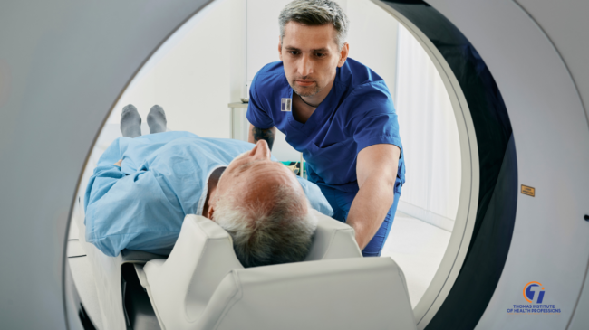 CT Technologist Putting Patient Into CT Scanner